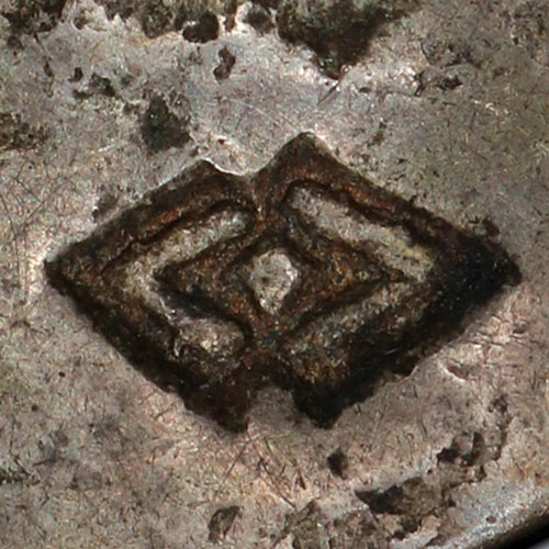 Unknown symbol commonly seen chopmarked on coins