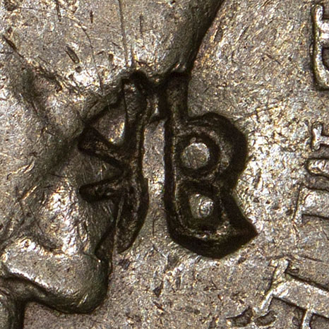possibly 䢶 - (variant of 邦) bāng - nation, country, sovereign state, a surname