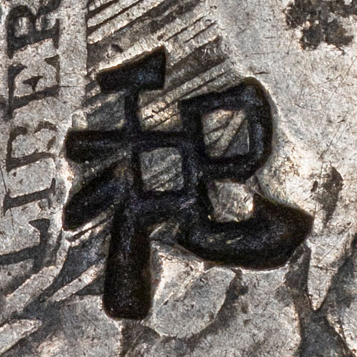 Possibly 䄫 - qǐ - an ancient word with no known meaning