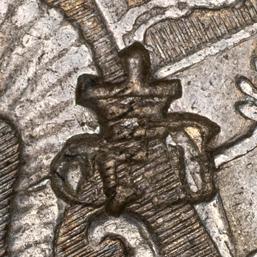 Unknown chopmark, possibly two overlapping marks